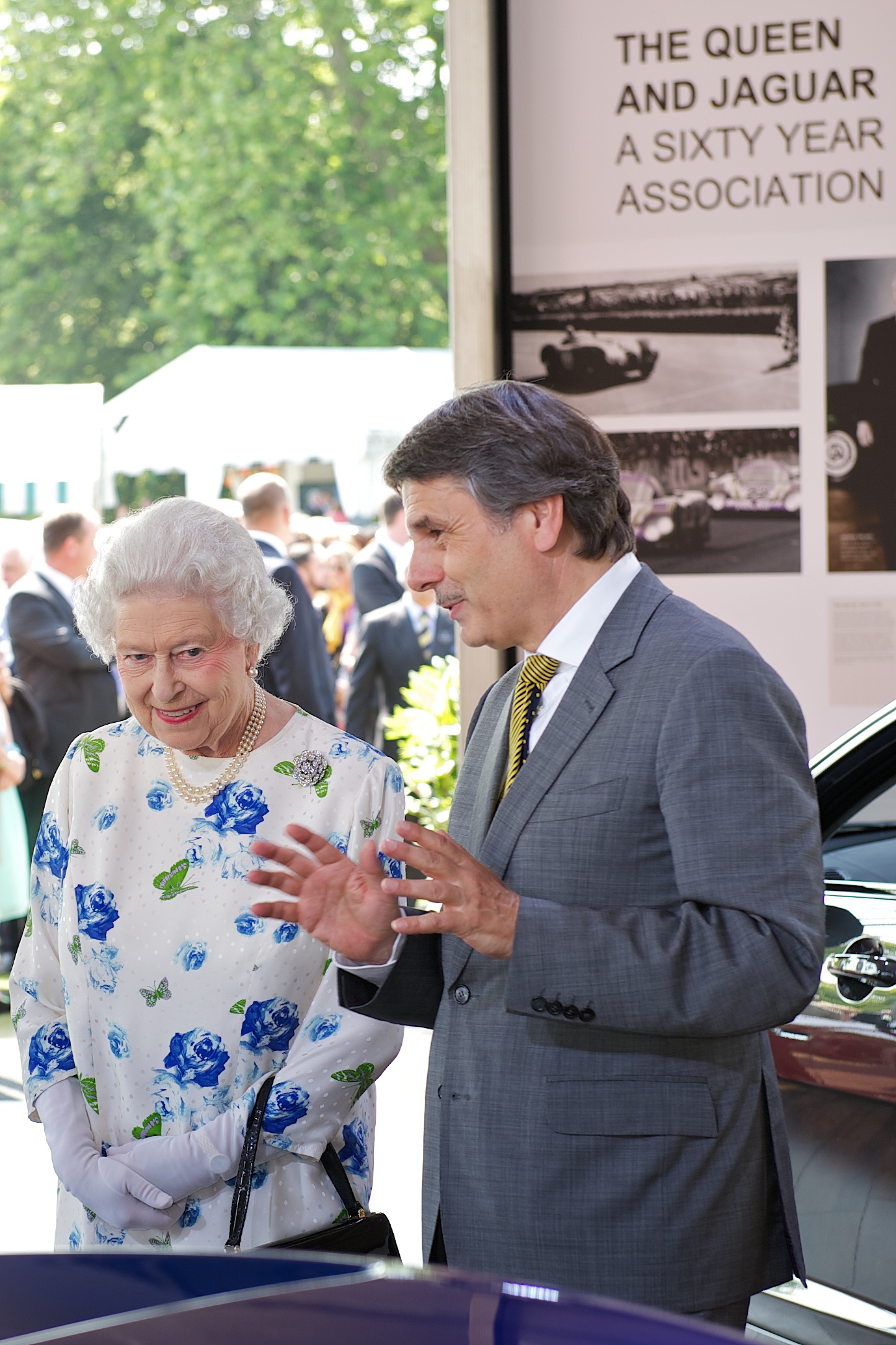 Her Majesty Queen Elizabeth II and Ralf Speth attend the Jaguar Land Rover Pavillion at The Coronation Festival at Buckingham Palace, London, 11th July 2013.