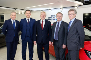 EDITORIAL USE ONLY Ministers meet executives from across the UK automotive industry to discuss the sector's priorities for exiting the EU. Pictured left to right: Adrian Hallmark, Director of Strategy, Jaguar Land Rover; Mike Hawes, SMMT Chief Executive; David Davis, Secretary of State for Exiting the European Union; Rory Harvey, Chairman and MD, GM - Vauxhall UK; and Ian Howells, Senior Vice President, Honda Motor Group. PRESS ASSOCIATION Photo. Picture date: Monday December 12, 2016. Photo credit should read: Frantzesco Kangaris/PA Wire